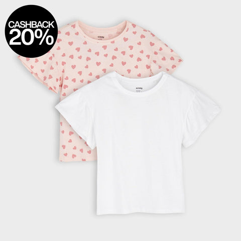 Two children's t-shirts with heart patterns on a white background