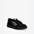 A black low-top sneaker with white graphic accents on the side and tongue, shown from a three-quarters angle against a plain white background.