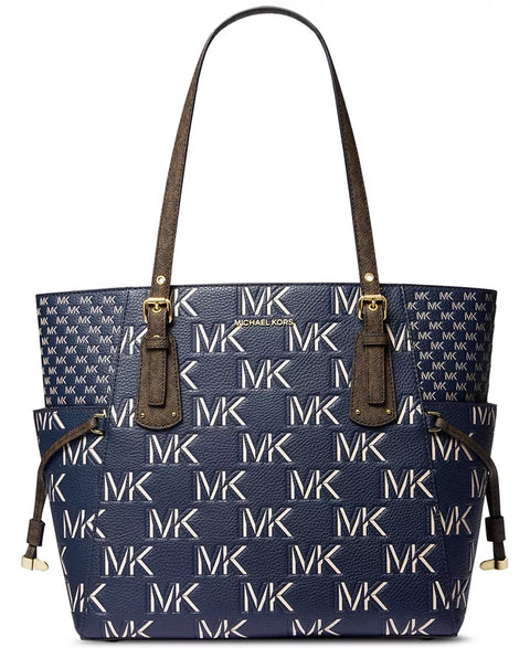 Navy blue handbag with gold MK logo pattern on a white background