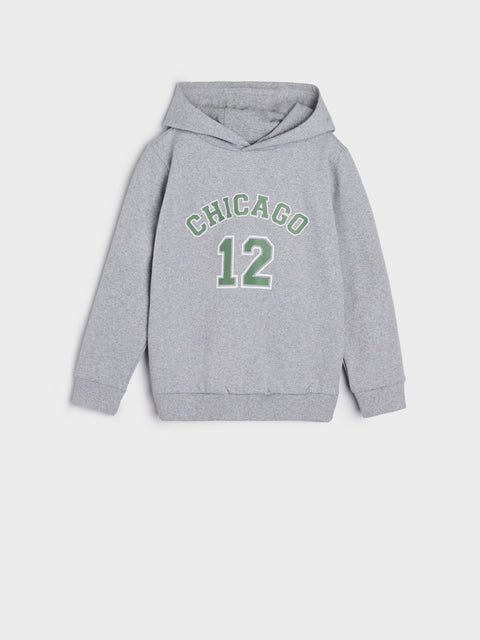 Gray hoodie with 'Chicago 12' text on a light gray background