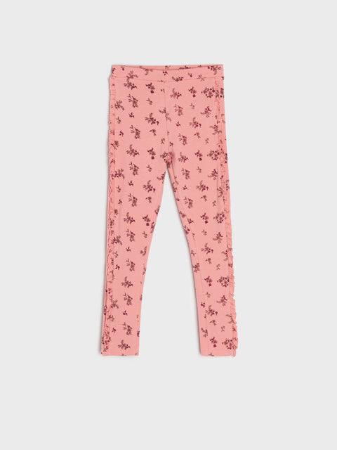 Pink leggings with floral pattern on a white background