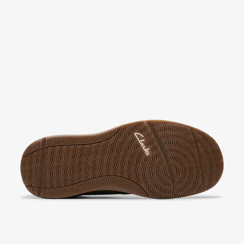 Brown shoe sole with visible brand logo on a white background