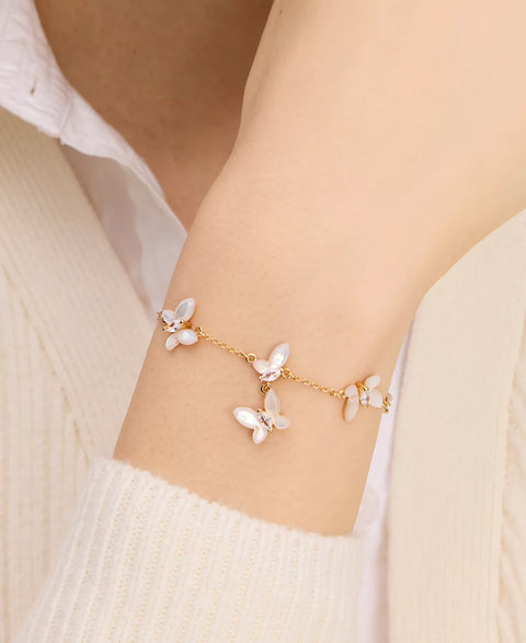Kate Spade Paris Women's Gold-Tone Cubic Zirconia & Mother-of-Pearl Butterfly Link Bracelet | Kate Spade in Lebanon