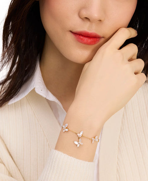 Kate Spade Paris Women's Gold-Tone Cubic Zirconia & Mother-of-Pearl Butterfly Link Bracelet | Kate Spade in Lebanon