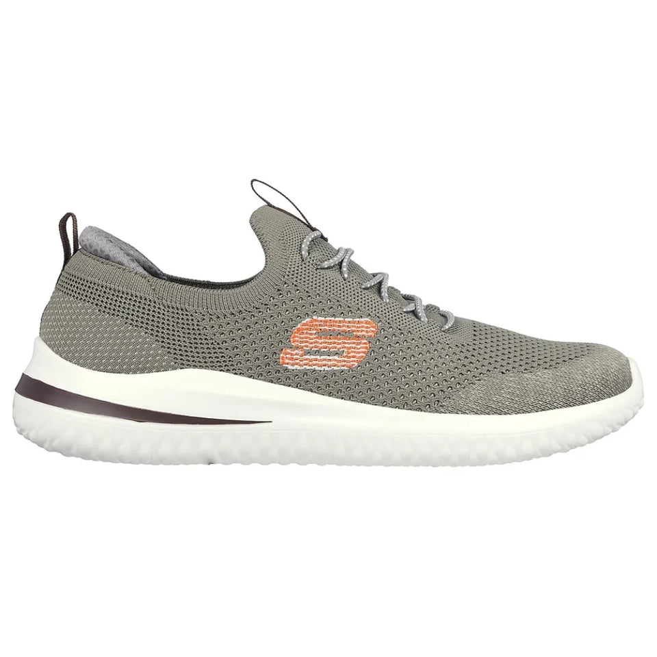 Navy blue casual shoe with brown accents on a white background