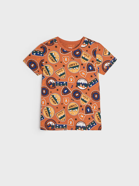 Orange t-shirt with colorful graphic design on a white background