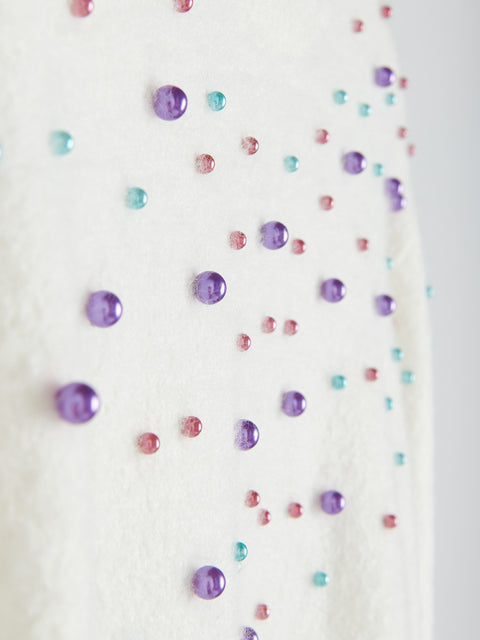 Colorful confetti on a white background
