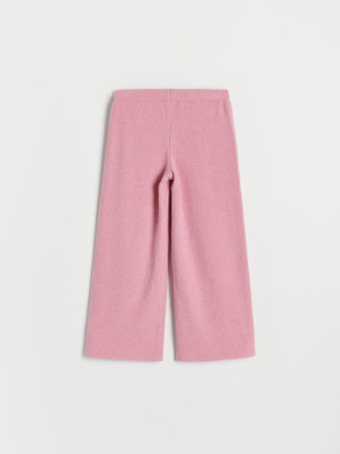 Pink pants on a light gray background