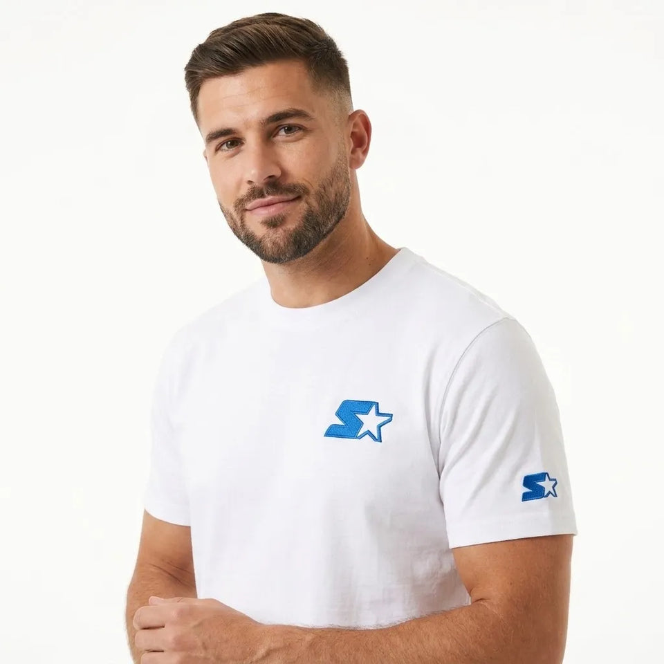 A man wearing a white crewneck t-shirt with a blue and white Starter logo on the left chest and sleeve, photographed against a clean white background.