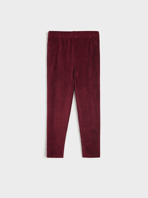Maroon leggings on a white background