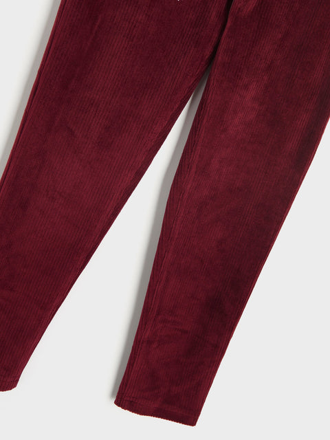 Maroon pants on a white background