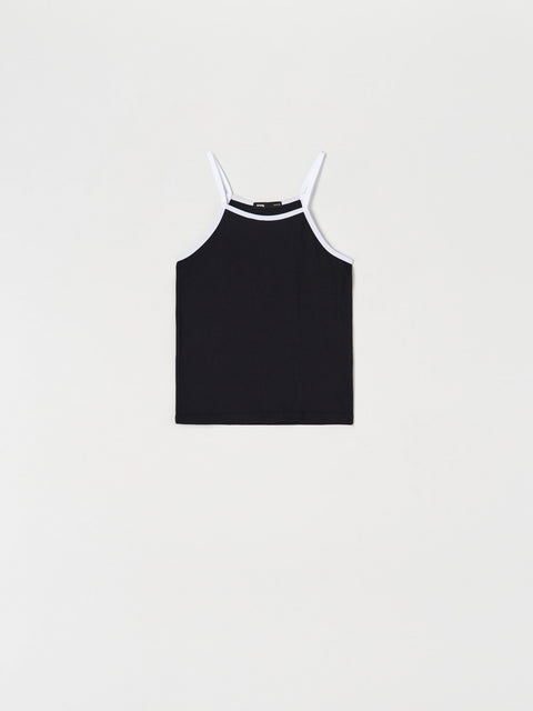 Black tank top with white straps on a light gray background