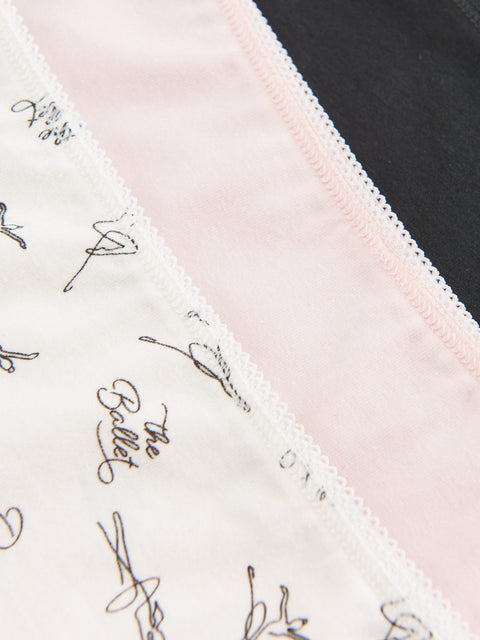 Close-up of ballet-themed products including a white fabric with 'Ballet' text, pink fabric, and black fabric.