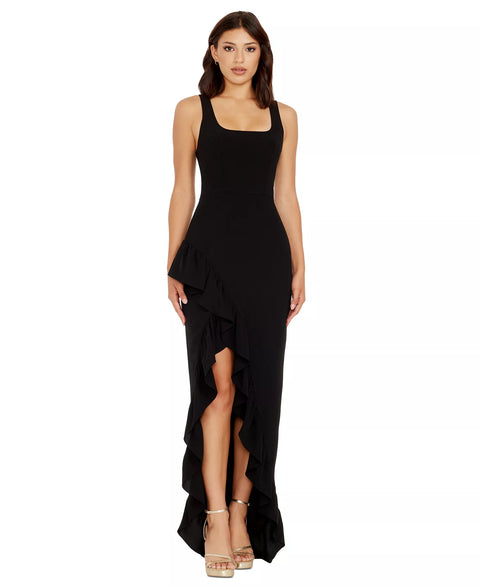 Woman wearing a black sleeveless dress with a slit on a white background