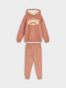 Pink hoodie and pants set with 'Wild Adventure' text on a white background