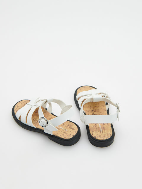 White sandals with cork sole on a white background