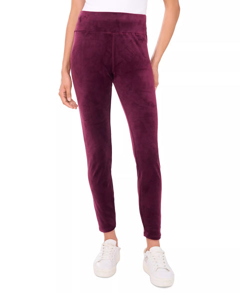 Purple pants worn by a person on a white background
