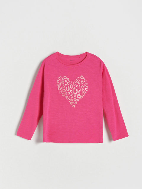 Pink long-sleeve shirt with a heart-shaped leopard print design on a light gray background