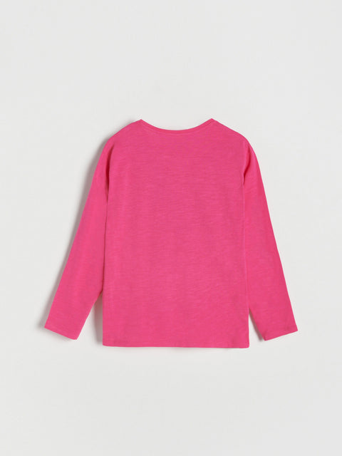 Pink long-sleeve shirt on a light gray background