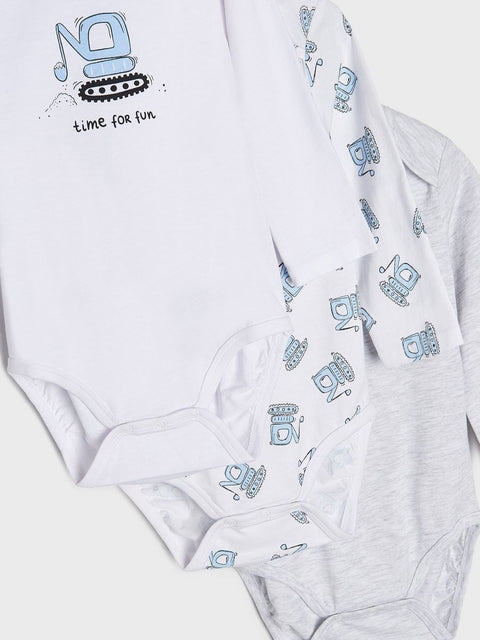 White baby onesie with blue truck pattern and text on a white background