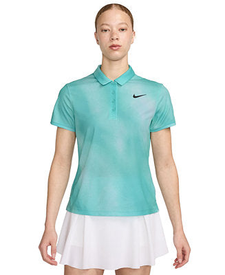 Person wearing a teal Nike polo shirt and white skirt on a white background