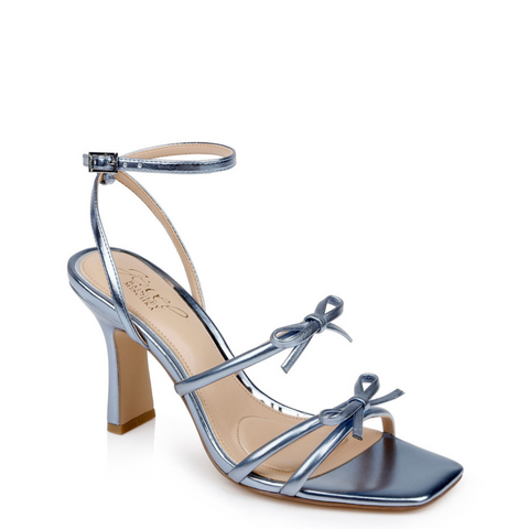 Metallic silver sandal with bow detail on a white background