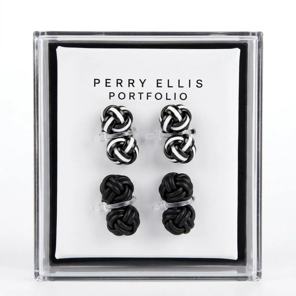 A Perry Ellis Portfolio jewelry gift set in a clear acrylic box, featuring four pairs of knotted cufflinks in black and white on a white backing card.