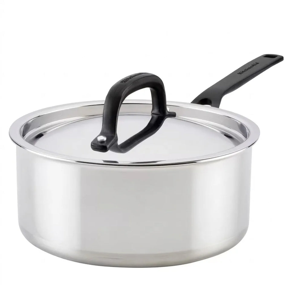 A stainless steel saucepan with a matching lid, featuring black plastic handles and a polished silver finish, shown on a solid white background.