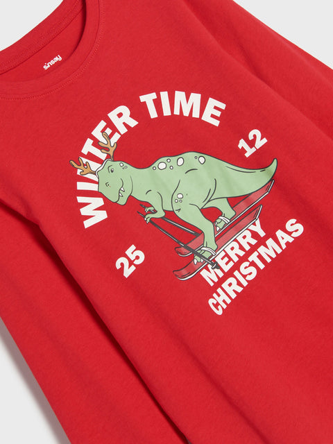 Red shirt with a green dinosaur graphic and text on a white background
