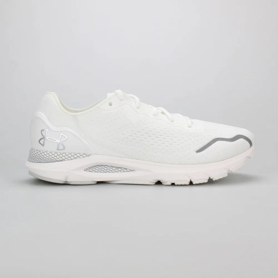 A white Under Armour running shoe shown from the side against a light gray studio background.