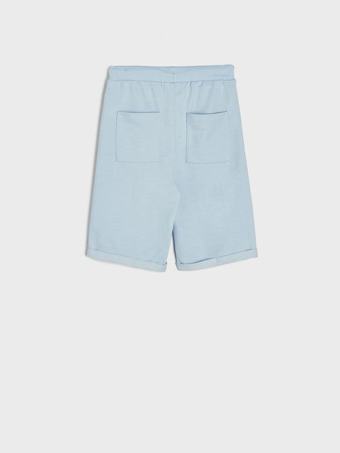Light blue shorts on a white background