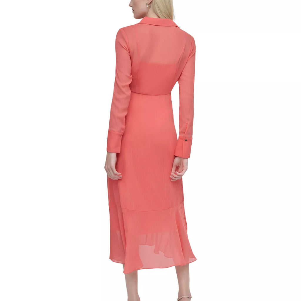 A woman shown from the back wearing a coral pink long-sleeve midi dress with a structured collar and sheer upper back panel, paired with beige high-heeled sandals against a plain white background.