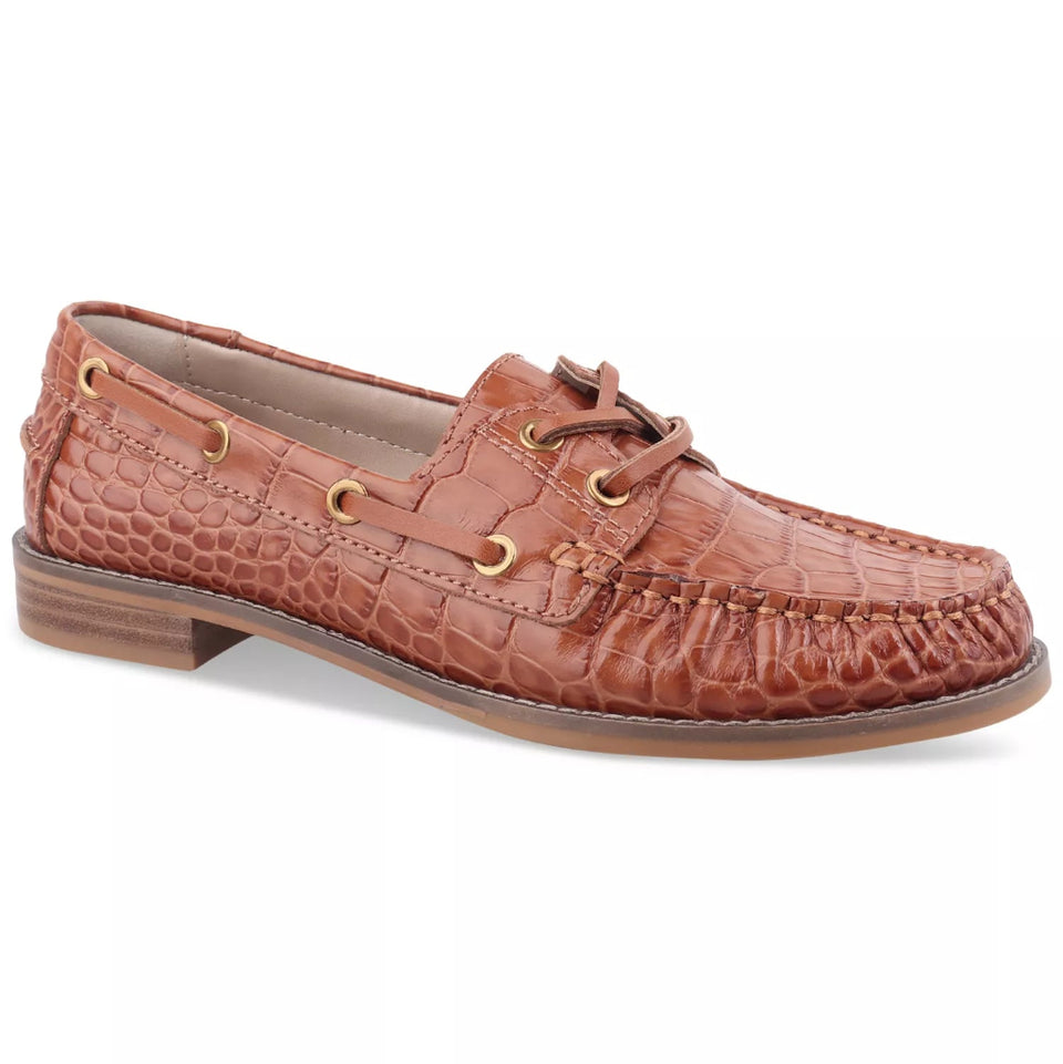 Brown leather boat shoe on a white background