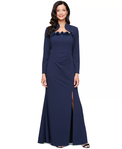 Woman wearing a navy blue dress with a matching jacket on a white background