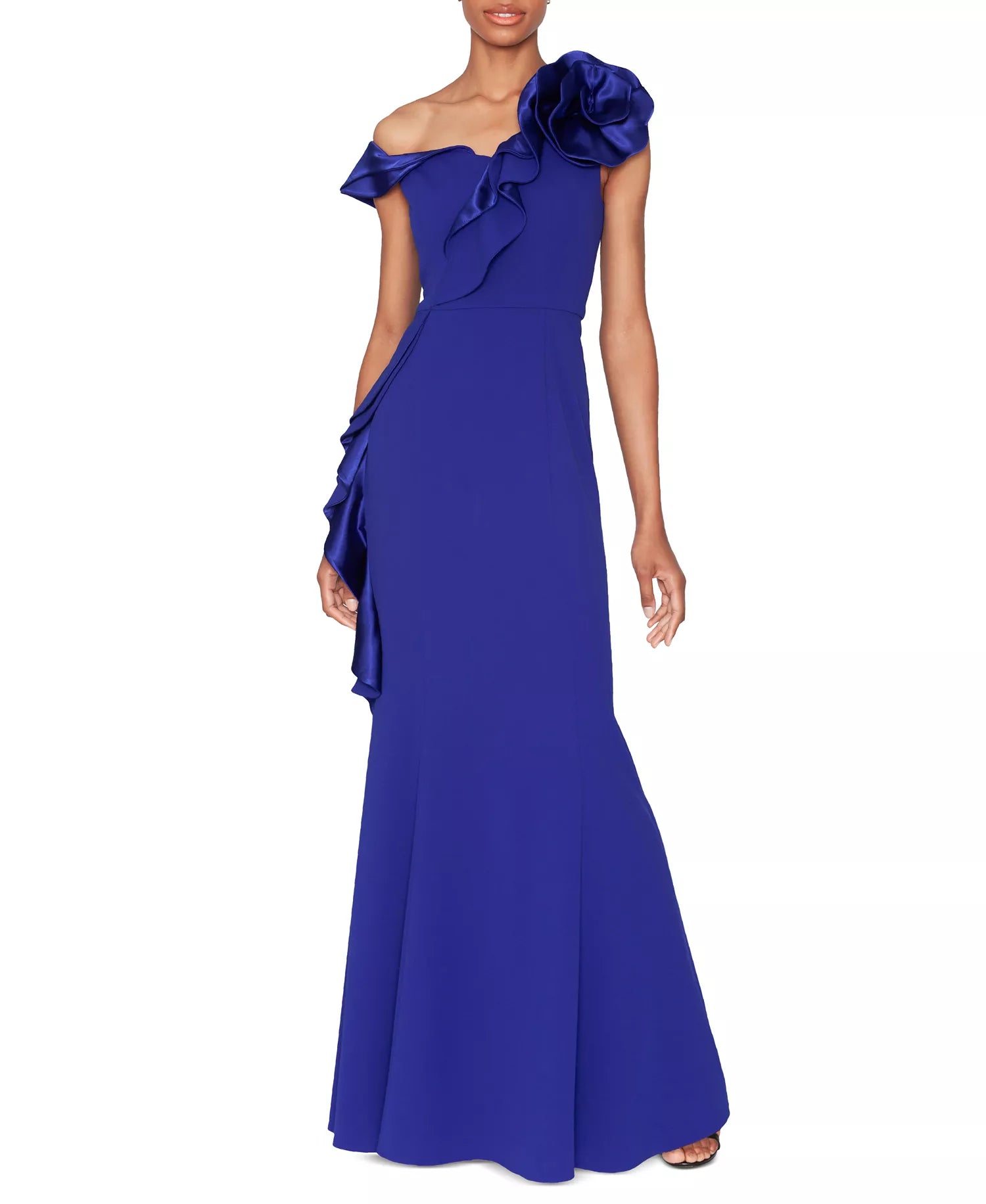 Blue one-shoulder evening gown with ruffle details on a white background