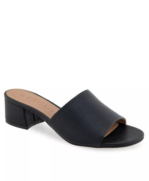 Black sandal with a block heel on a white background