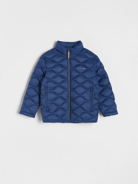 Blue quilted jacket on a light gray background