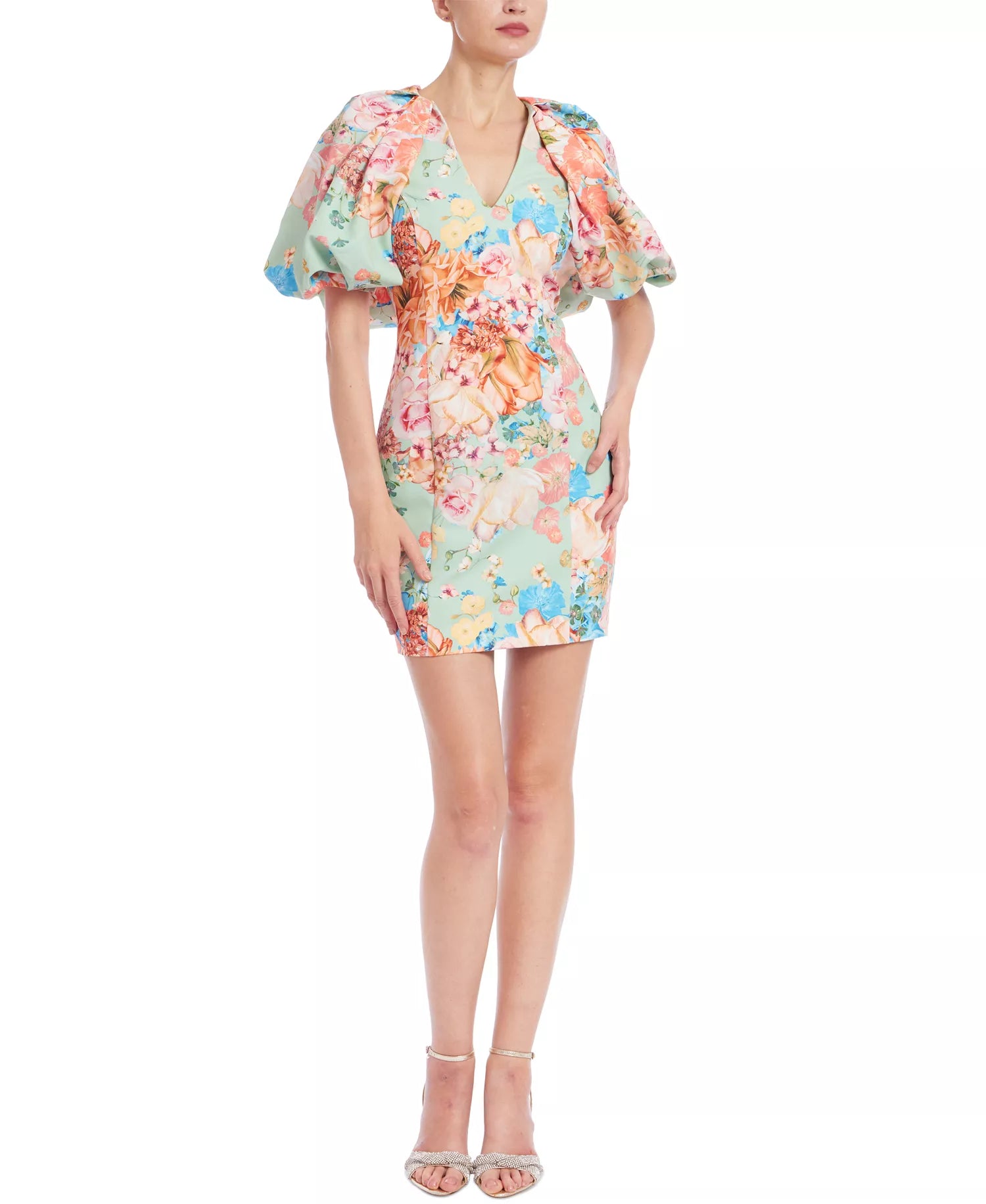 Woman wearing a floral dress on a white background
