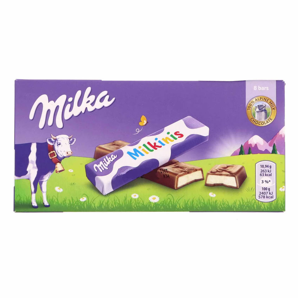 Milka chocolate bar packaging with a cow and nature background