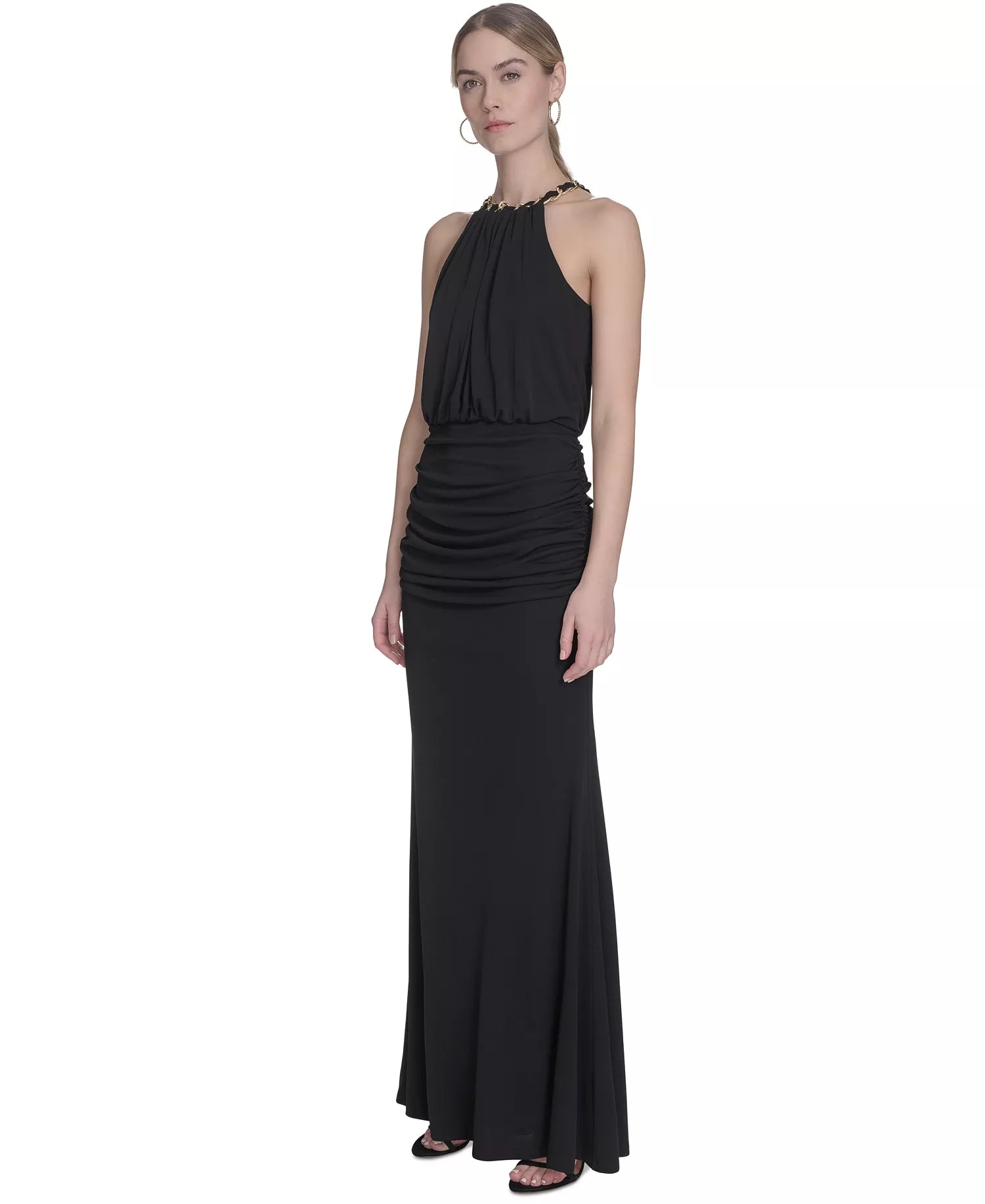 Black halter neck gown on a white background