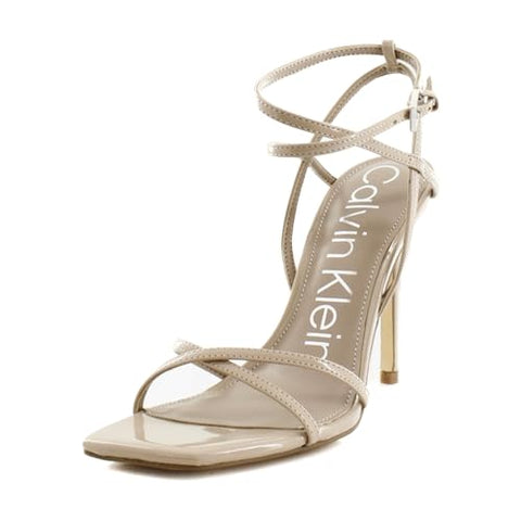 Beige high-heeled sandal with 'Calvin Klein' branding on a white background
