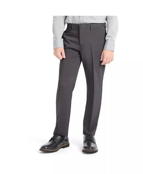 Person wearing gray dress shirt and dark gray pants on a white background