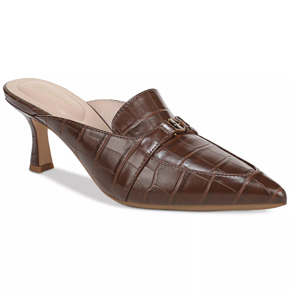 A brown pointed-toe mule heel with an embossed crocodile pattern and a small gold-tone decorative buckle on the strap, shown against a plain white background.