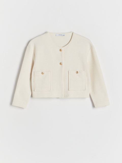 White jacket with gold buttons on a white background