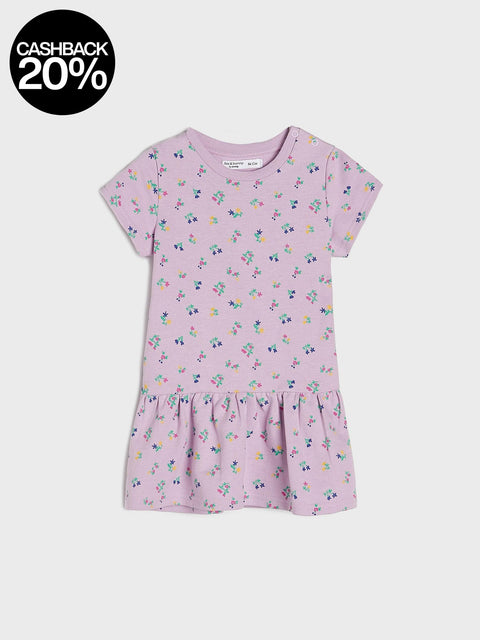 Pink floral dress on a white background