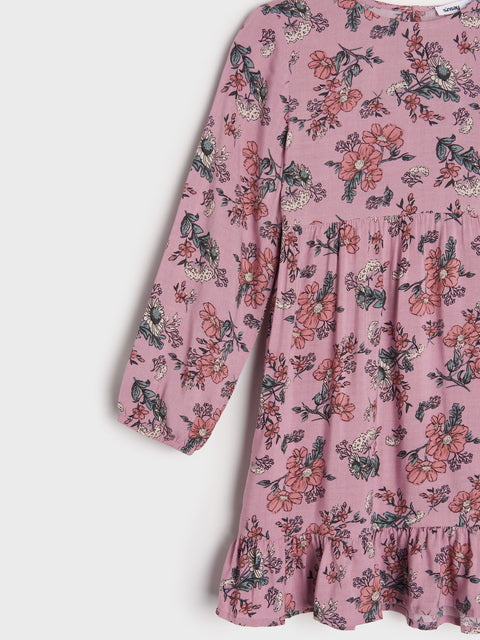 Pink floral dress with long sleeves on a white background