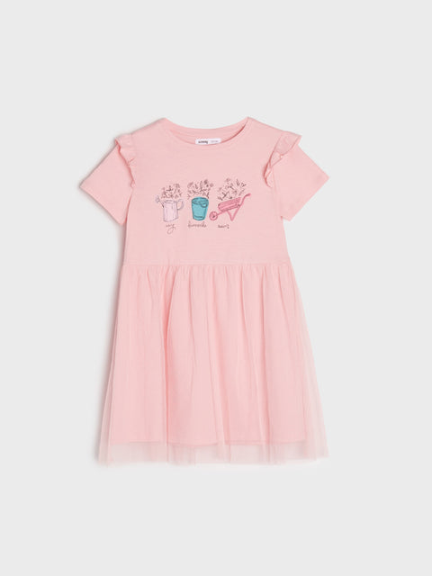 Pink dress with graphic design on a white background