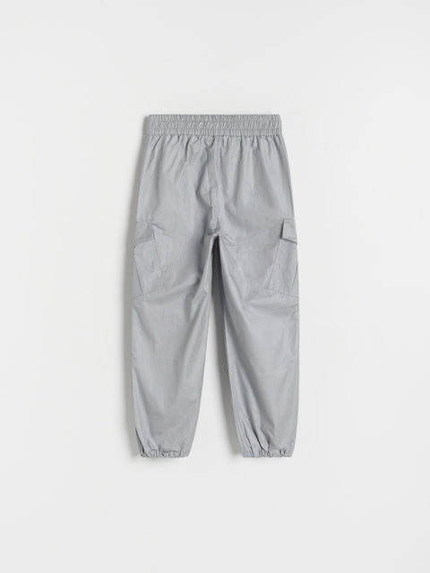 Gray jogger pants on a white background