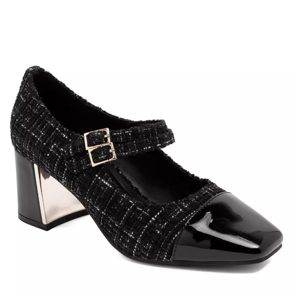 Black shoe with a strap and block heel on a white background