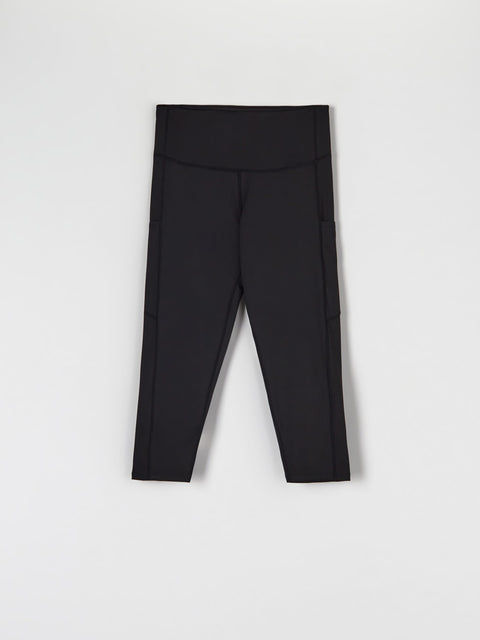 Black leggings on a light gray background